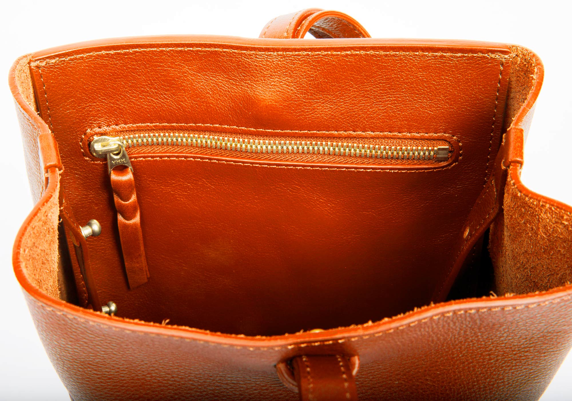 The Mini Sling Backpack Orange