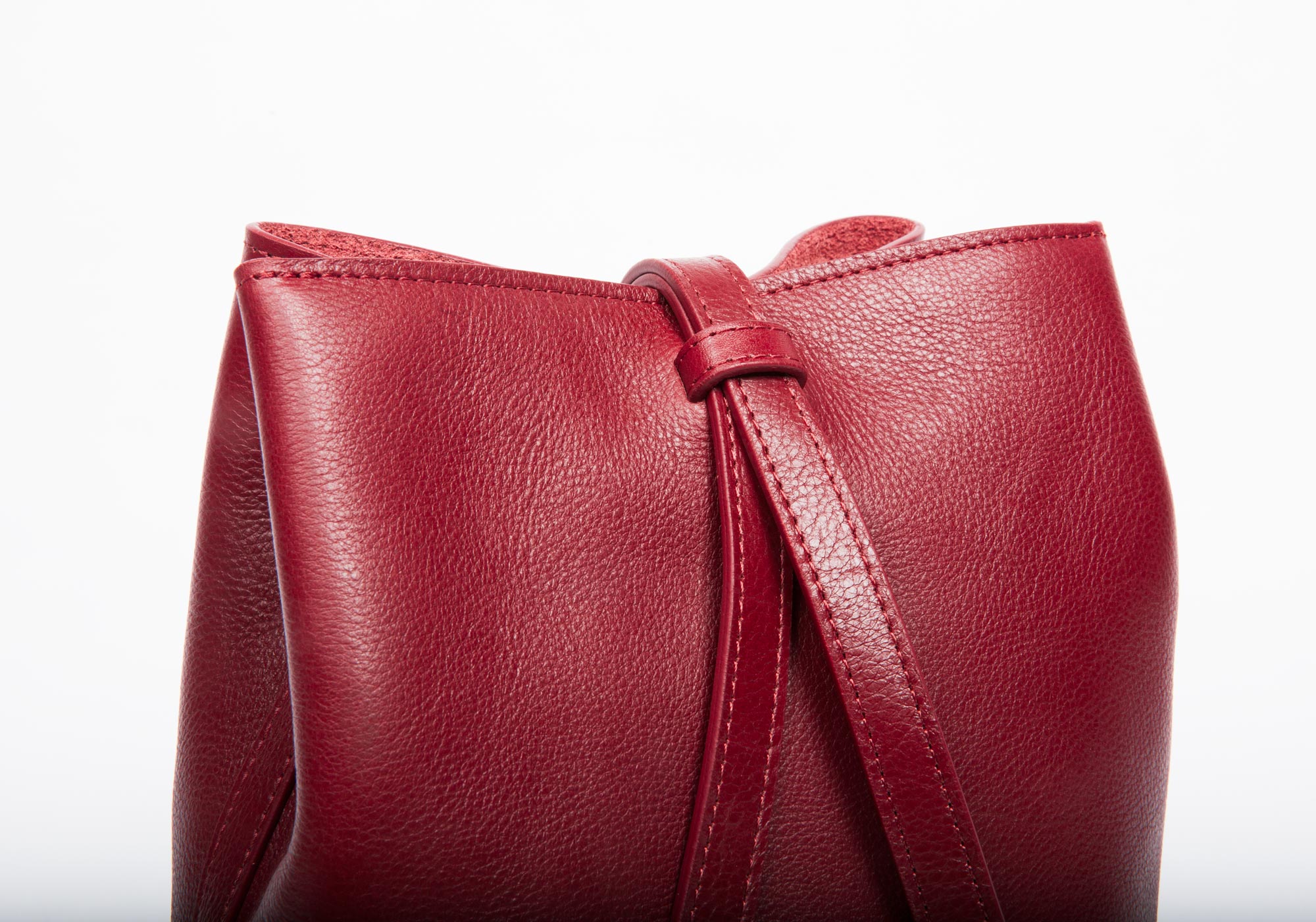 The Mini Sling Backpack Red