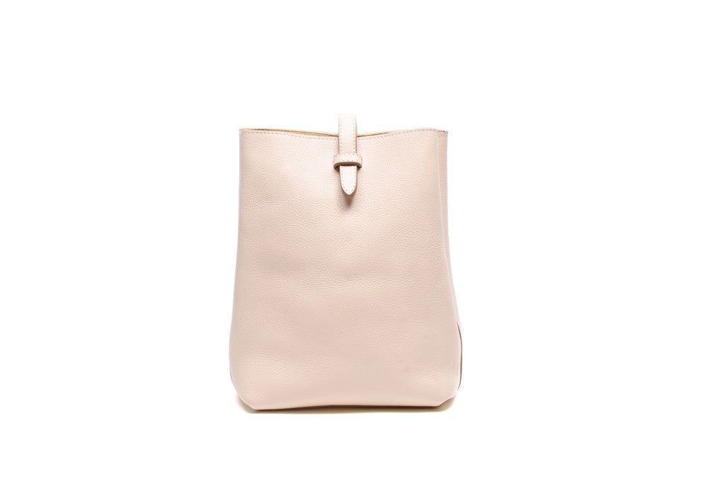 Front Leather View of The Mini Sling Backpack Natural